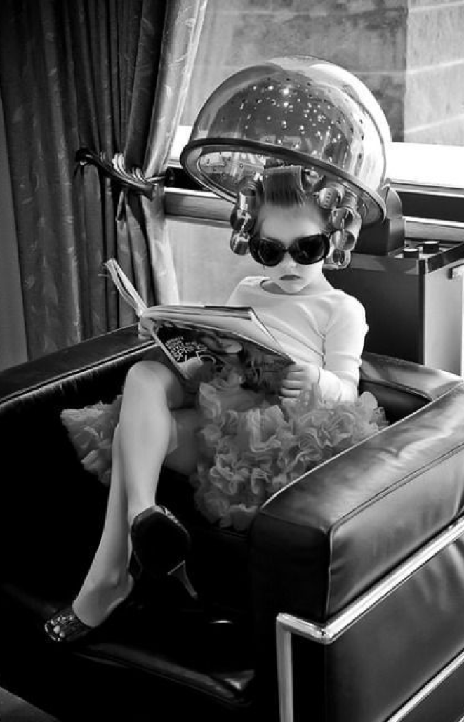 Child under hair dryer