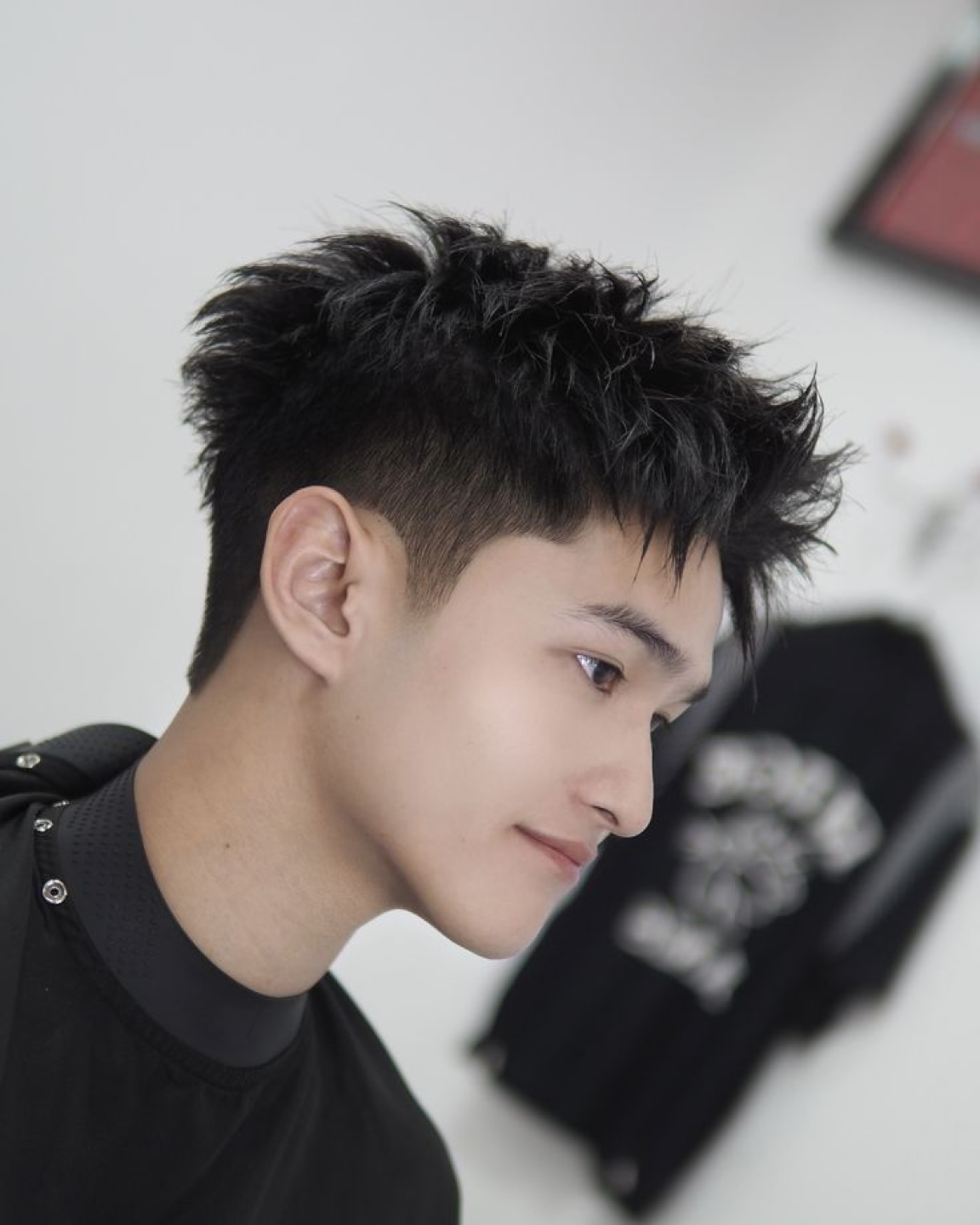 Man with styled hair in color